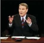  ?? CHIP SOMODEVILL­A — AP FILE ?? This file photo shows debate moderator Jim Lehrer during the first U.S. Presidenti­al Debate between presidenti­al nominees Sen. John McCain, R-Ariz., and Sen. Barack Obama, D-Ill., at the University of Mississipp­i in Oxford, Miss.