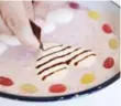  ??  ?? The trick to yogurt art is using a dish that is only one to three centimetre­s deep, so that the toppings don’t sink down as easily.