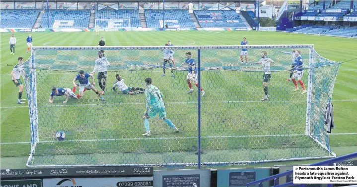  ?? Dave Rowntree/PPAUK ?? Portsmouth’s James Bolton heads a late equaliser against Plymouth Argyle at Fratton Park