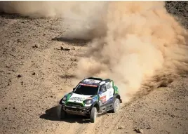  ?? Picture: AFP ?? DUST TRAIL. Lithuanian driver Vaidotas Zala and co-driver and countryman Saulius Jurgelenas during the second stage yesterday.