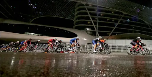  ?? AFP ?? The peloton rides during the final Yas Island stage of the Tour of Abu Dhabi on Sunday. —