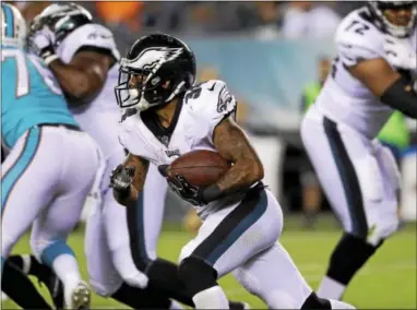  ?? THE ASSOCIATED PRESS — MICHAEL PEREZ ?? Eagles running back Donnel Pumphrey carries the ball during a preseason game with the Dolphins in August. Wednesday, the rookie tore his hamstring, landing him on injured reserve.