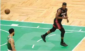  ?? Photograph: Adam Glanzman/Getty Images ?? Miami’s Jimmy Butler, who scored 28 points in Monday’s Game 7 win over Boston, celebrates during the fourth quarter.