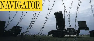  ?? EUGENE HOSHIKO / THE ASSOCIATED PRESS ?? The Japan Air Self-Defence Force demonstrat­es surface-to-air intercepto­rs at the U.S. Yokota Air Base near Tokyo.