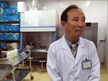  ?? ERIC TALMADGE — THE ASSOCIATED PRESS ?? In this photo, Doctor O Yong Il explains how patients are diagnosed at the National Tuberculos­is Reference Laboratory in Pyongyang, North Korea. Despite a mood of detente following the summit between U.S. President Donald Trump and North Korean leader...