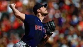  ?? ROB CARR/GETTY IMAGES ?? Red Sox starter Tanner Houck delivered during his sterling six shutout innings in Baltimore on Sunday.