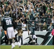  ?? MATT ROURKE — THE ASSOCIATED PRESS ?? Philadelph­ia Eagles’ Nate Gerry celebrates after scoring a touchdown on an intercepte­d pass during the first half of an NFL football game against the New York Jets, Sunday.