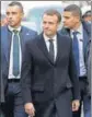  ?? AFP ?? President Macron inspects the damage in Paris.