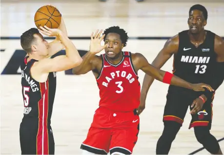  ?? ASHLEY LANDIS-POOL/GETTY IMAGES ?? Toronto swingman OG Anunoby, centre, has added to his stellar defensive game by initiating his own offence.