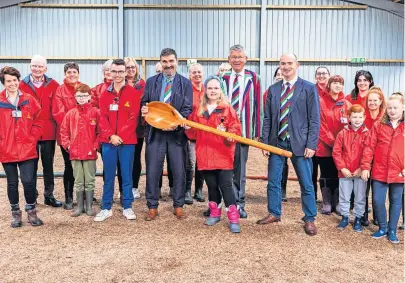  ?? ?? Saddling up The charity and guests showcase the new indoor equine therapeuti­c centre