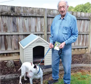  ??  ?? Warragul pensioner Werner Schutze has a new dog Bully but still misses his dog Rex that died after a vicious attack in June.
