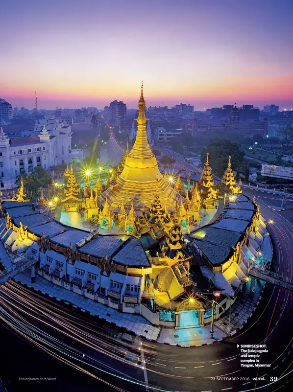  ??  ?? SUNRISE SHOT: The Sule pagoda and temple complex in Yangon, Myanmar