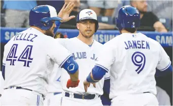  ?? DAN HAMILTON/USA TODAY SPORTS ?? A number of the youngsters in the Blue Jays lineup say they look up to Justin Smoak for his intelligen­ce, positive outlook and wicked sense of humour.