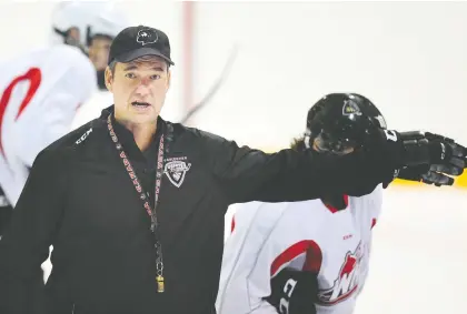  ?? NICK PROCAYLO/FILES ?? Vancouver Giants head coach Michael Dyck is at the centre of a lawsuit launched by two former junior hockey players who allege they were the targets of abuse as teens playing in the Canadian Hockey League. A former player has already come to Dyck’s defence.