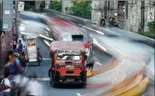  ?? NOEL CELIS / AGENCE FRANCE-PRESSE ?? This picture taken on Jan 18 shows jeepneys during rush hour in Manila.