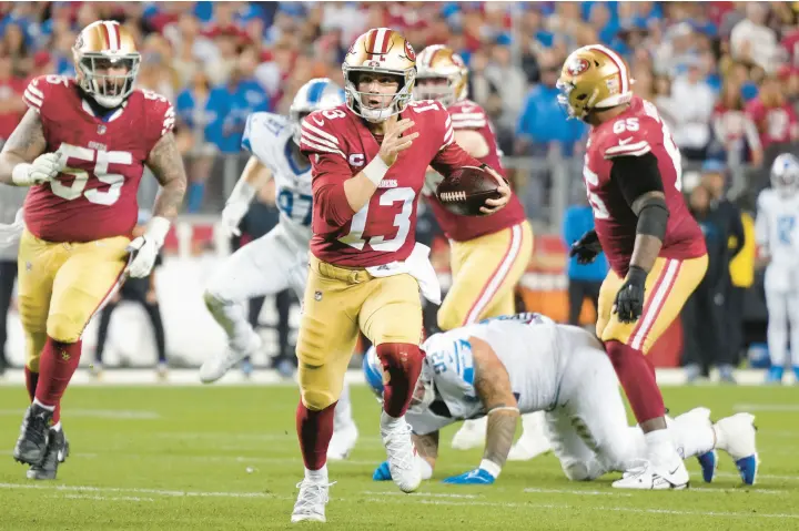  ?? THEARON W. HENDERSON/GETTY ?? 49ers quarterbac­k Brock Purdy runs the ball against the Lions in the NFC championsh­ip game Sunday at Levi’s Stadium in Santa Clara, California.