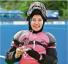  ??  ?? Still hopeful: Farah ayuni yahya is keeping her fingers crossed that the knockout stages of the England National Women’s hockey semifinal match would be played in May.