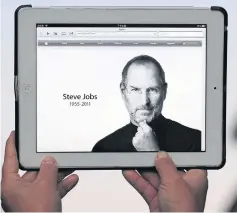  ?? AFP ?? In this file photo taken on October 5, 2011 an iPad 2 displaying the changed Apple website paying homage to the company’s visionary leader Steve Jobs who died from cancer aged just 56.