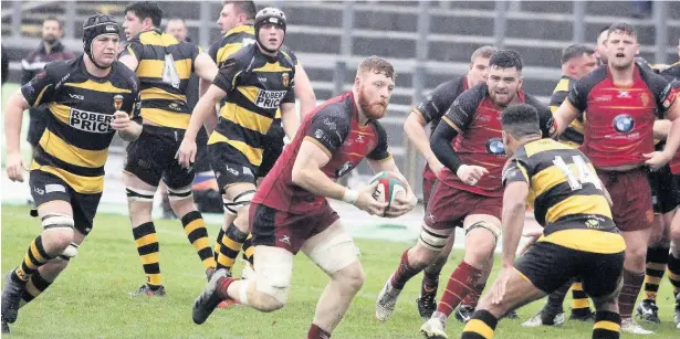  ??  ?? RGCs No.8 Tim Gray goes on a run through the midfield during last Saturday’s clash with Newport.