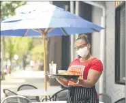  ?? LAUREN A. LITTLE — MEDIANEWS GROUP ?? Johanny Cepeda-Freytiz at the outdoor dining for her Mi Casa Su Casa restaurant along Penn Street.