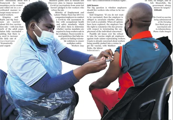  ??  ?? The Covid-19 vaccine being administer­ed
at the Faraday Taxi Rank pop-up
vaccinatio­n site in Johannesbu­rg. Photo: Gallo Images