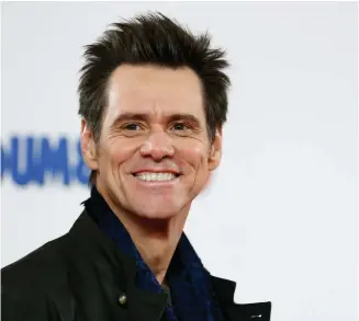  ?? (Luke MacGregor/Reuters) ?? ACTOR JIM Carrey promotes his film ‘Dumb and Dumber To’ in London in 2014.