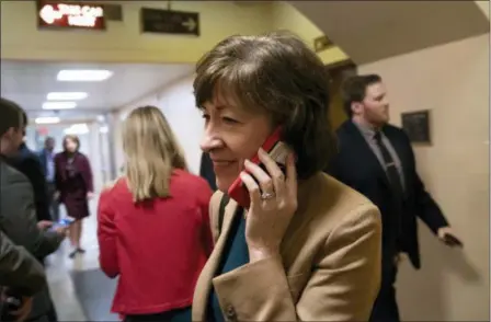  ?? J. SCOTT APPLEWHITE — THE ASSOCIATED PRESS ?? Sen. Susan Collins, R-Maine, arrives in the Senate where she has said she will vote for a resolution to annul President Donald Trump’s declaratio­n of a national emergency at the southwest border, on Capitol Hill in Washington, Thursday.