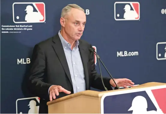  ??  ?? Commission­er Rob Manfred said the calendar dictated a 60-game season. JOHN RAOUX/AP