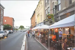  ?? Alexander Soule / Hearst Connecticu­t Media ?? Diners along Washington Street’s restaurant row in South Norwalk on Tuesday.