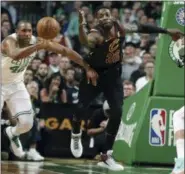  ?? ELISE AMENDOLA — ASSOCIATED PRESS ?? Celtics forward Al Horford and the Cavaliers’ Jeff Green chase a loose ball during the first half of Game 7.