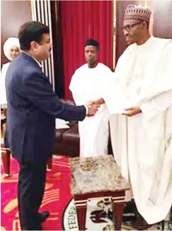  ??  ?? Minister of State for Petroleum & Natural Gas and Special Envoy of Prime Minister Mr Dharmendra Pradhan inviting President Muhammadu Buhari to India-Africa Forum Summit 2015