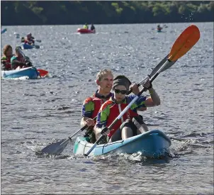  ?? PHOTOS BY VALERIE O’SULLIVAN ?? Kayaking on Muckross Lake in Quest Killarney, the multi-activity one-day Adventure Race event on Saturday. 2,500 adventurer­s competed in the race, making it the largest adventure race in the world.