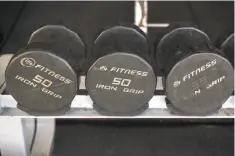  ??  ?? Current and former customers of the San Ramon chain, which uses branded weights, have six months to get their money back.