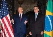  ?? (AP/Alex Brandon) ?? President Donald Trump appears with Brazilian President Jair Bolsonaro before a dinner Saturday evening at Trump’s south Florida resort.