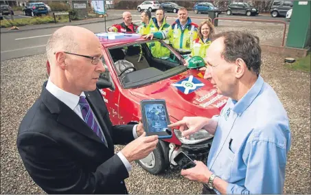  ?? Picture: Steve MacDougall. ?? John Swinney MSP chats to Dr Colville Laird (medical director of BASICS Scotland) at the launch.