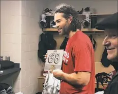  ?? Sam Werner/Post-Gazette ?? Former Penguins great Jaromir Jagr was given a piece of the Mellon Arena roof Tuesday. Jagr, now with the Florida Panthers, was a member of Penguins teams that won two Stanley Cups at the old arena.