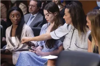  ?? POOL AFP ?? SPEAKING UP: U.S. gymnasts Simone Biles, McKayla Maroney, Aly Raisman and Maggie Nichols, from left, arrive to testify during a Senate Judiciary hearing last week about the inspector general's report on the FBI’s handling of the Larry Nassar investigat­ion.