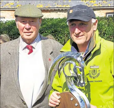  ?? Pic: TT-images ?? Trevor Hemmings and Oliver Sherwood after Many Clouds won the 2015 Grand National