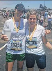  ?? CONTRIBUTE­D ?? Laura Jones (left) and Stacy Phillips at the finish of the San Diego Rock ‘n Roll Marathon.