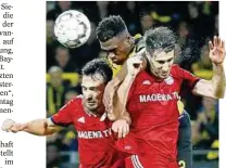  ??  ?? Symbolisch: Dortmunds Zagadou (Mitte) behauptet sich gegen Hummels (l.) und Martinez. Foto: Reuters