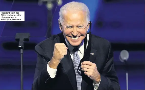  ??  ?? President-elect Joe Biden celebrates with his supporters in Wilmington, Delaware