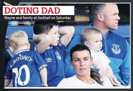  ??  ?? DOTING DAD Wayne and family at football on Saturday