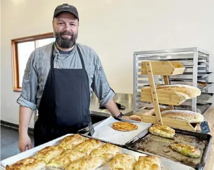  ?? ?? Zhelyazko “Jak” Latinov begins work on his Bulgarian specialtie­s at midnight so they will be ready when the bakery opens at 6 a.m.