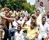  ?? PTI ?? Telugu Desam Party workers shout slogans during a protest against the Telangana government for passing the bill to hike reservatio­n in Hyderabad on Sunday. —