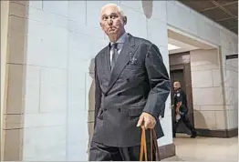  ?? ANDREW HARNIK/AP ?? Roger Stone arrives to testify Tuesday before the House intelligen­ce committee.
