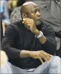  ?? David T. Foster III / TNS ?? Charlotte Hornets owner Michael Jordan watches his team play the Atlanta Hawks in Charlotte, N.C.