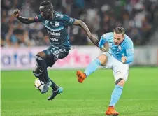  ??  ?? SCARE: Ross McCormack is fouled by Thomas Deng in City’s loss to Victory on Saturday at AAMI Park.