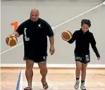  ?? MONIQUE FORD/FAIRFAX NZ ?? Fats Moke plays basketball with his son Rufus, 11.