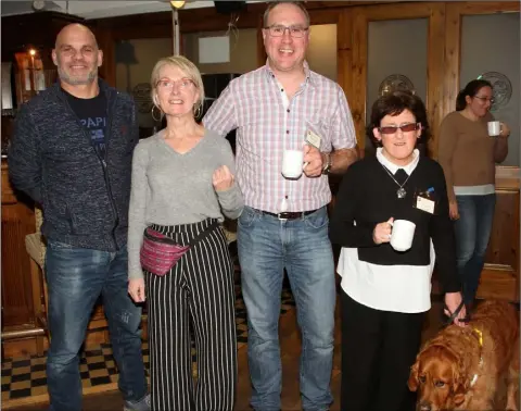  ??  ?? Enjoying themselves at the Wexford Toastmaste­rs open evening in Wexford Harbour Boat and Tennis Club on Thursday night were Dimitry Diamond, Margaret Crosbie, Michael Finn and Emer Mulhall with her guide dog Trudy.
