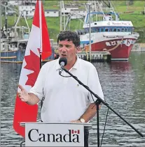  ?? ANDREW ROBINSON/TC MEDIA ?? Federal Fisheries Minister Dominic LeBlanc speaks on the south-side wharf in Bay de Verde Monday afternoon. It was his first visit to Newfoundla­nd and Labrador since becoming the federal minister.